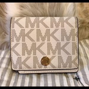 Michael Kors jet set travel flap card holder.